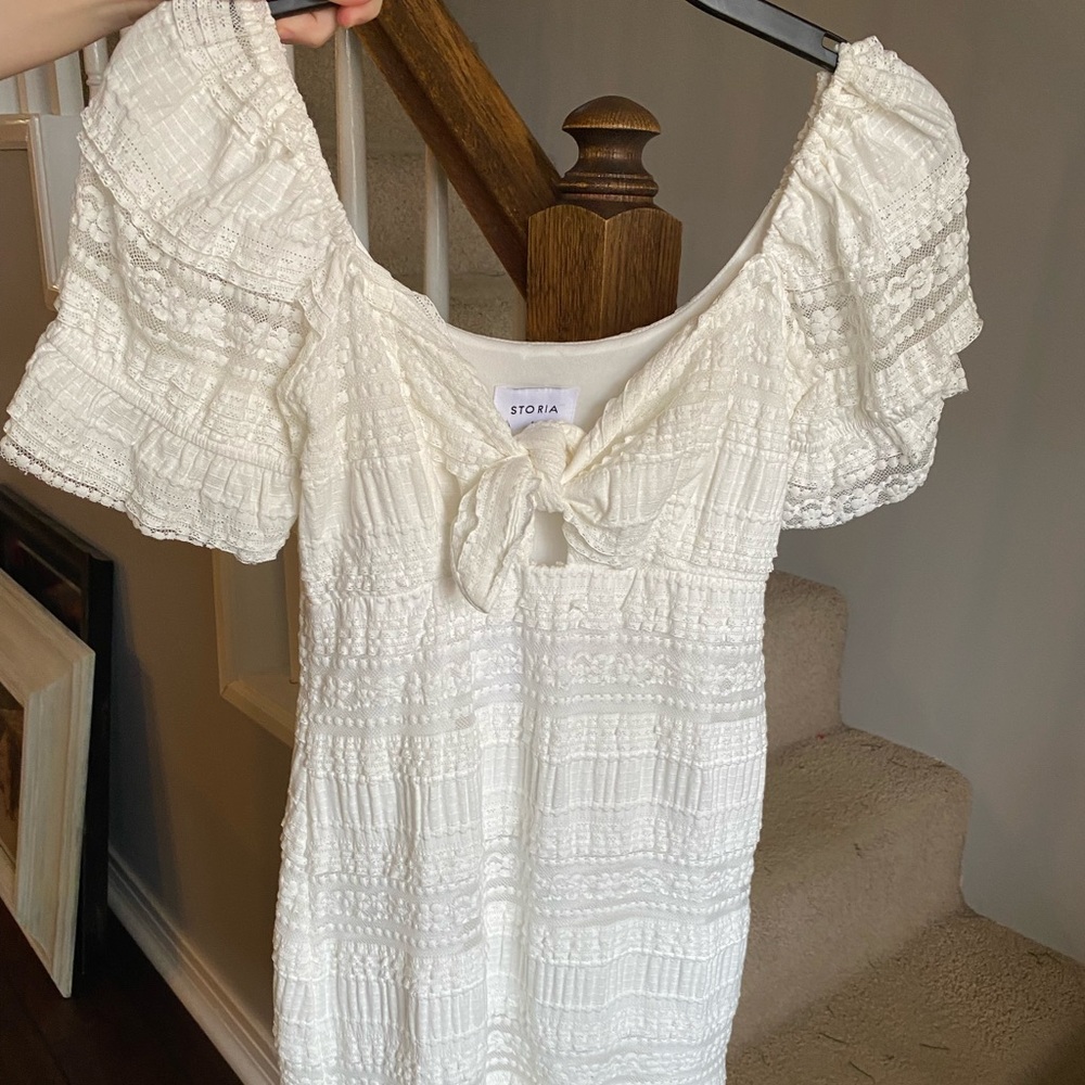 Lace dress with front tie